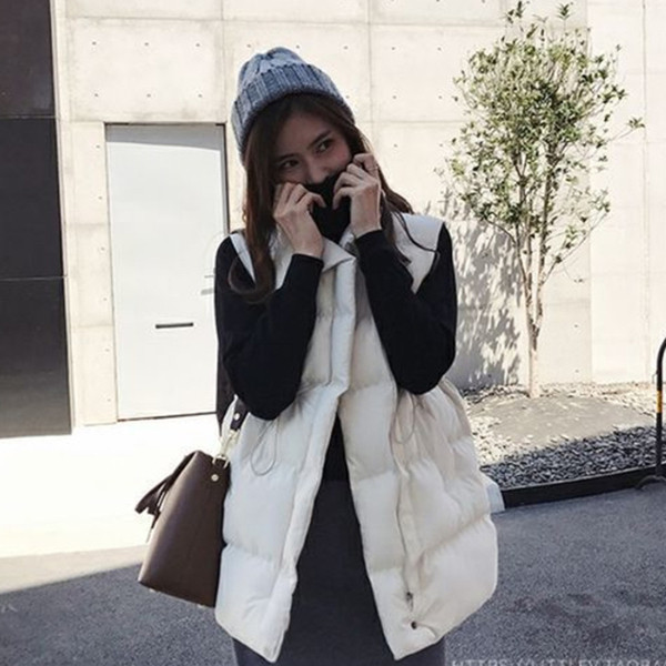 Naiste vabaajavest kõrge krae ja vöökohaga sidemetega