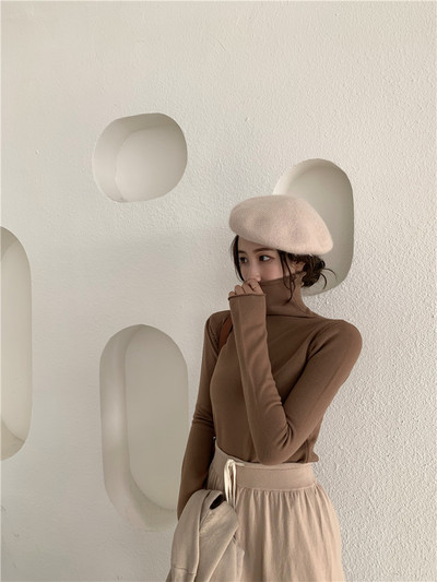 Naiste vabaaja liibuva kõrge kraega kampsun