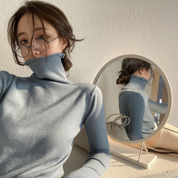 Naiste vabaaja liibuva kõrge kraega kampsun