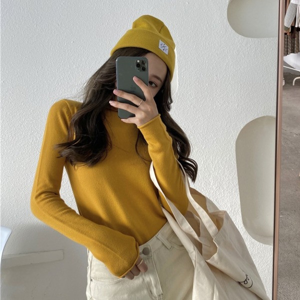 Naiste vabaaja liibuva kõrge kraega kampsun