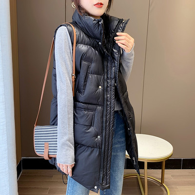 Pika krae ja taskutega naiste vest