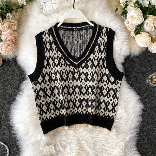 Kootud naiste vest spits-kaelusega