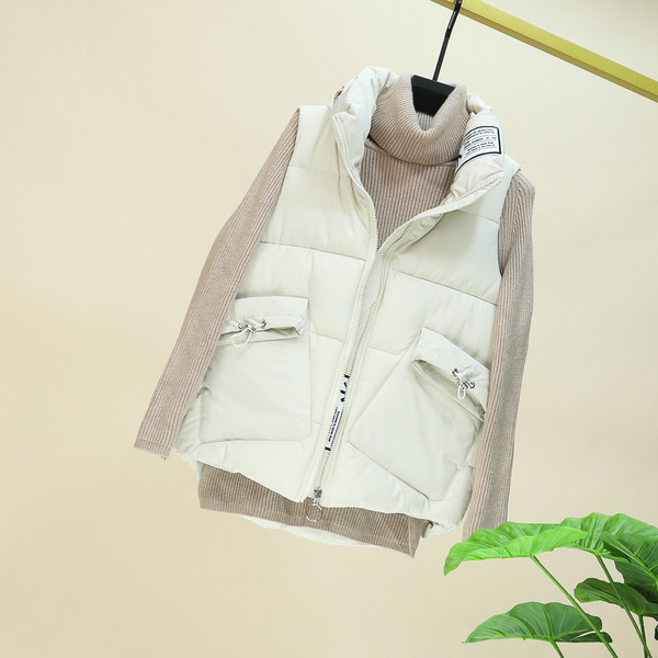 Naiste fliisvest taskute ja kõrge kraega