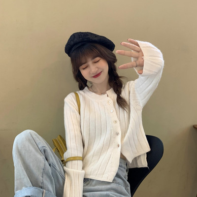 Moodne naiste vesti asümmeetriline ovaalse kaelusega mudel