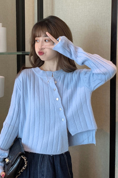 Moodne naiste vesti asümmeetriline ovaalse kaelusega mudel