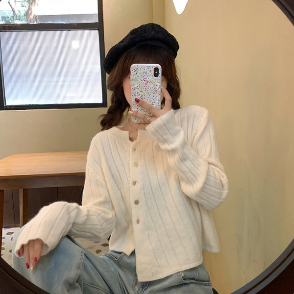 Moodne naiste vesti asümmeetriline ovaalse kaelusega mudel