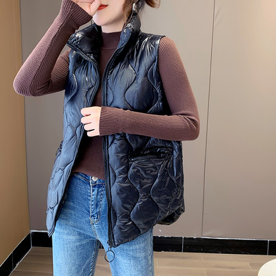 Naiste sügisvest kõrge krae ja taskutega