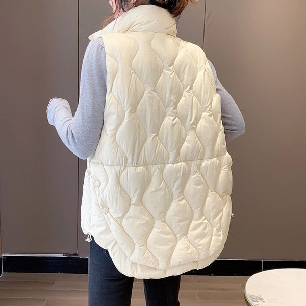 Naiste sügisvest kõrge krae ja taskutega