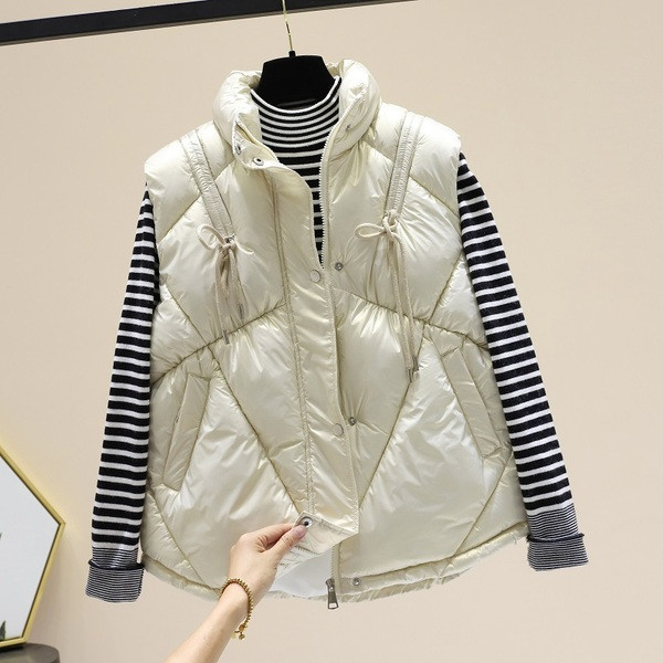 Kõrge krae ja taskutega läikiv naistevest