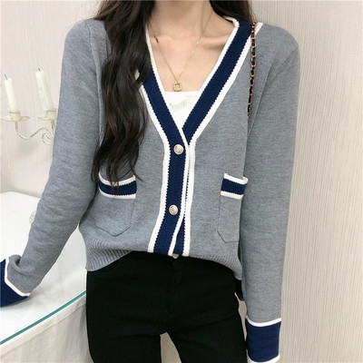 Šiuolaikinė moteriška liemenė su špicine iškirpte ir kišenėmis