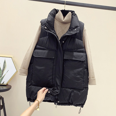 Sportlik vabaaja naiste vest kõrge krae ja taskutega