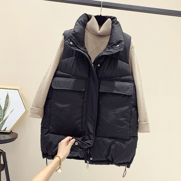 Sportlik vabaaja naiste vest kõrge krae ja taskutega