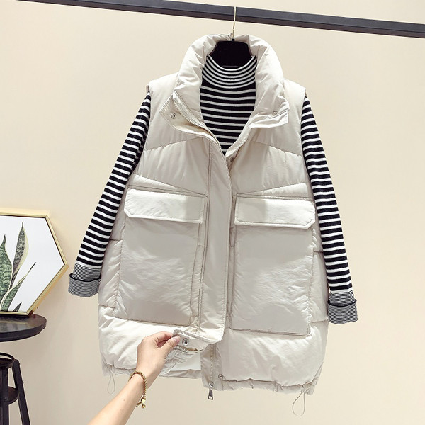 Sportlik vabaaja naiste vest kõrge krae ja taskutega