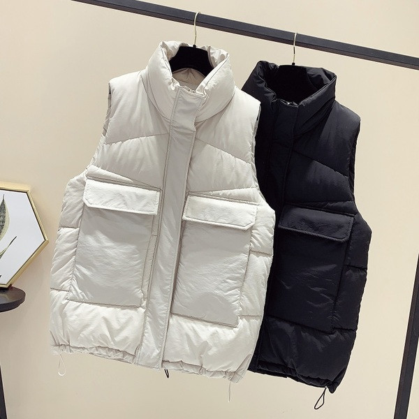 Sportlik vabaaja naiste vest kõrge krae ja taskutega