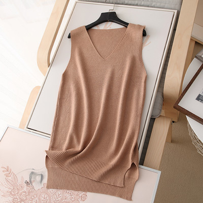 Pikk vabaaja kootud vest spitsikaelusega