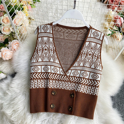 Megzta moteriška liemenė su dvigubomis sagomis ir špicine iškirpte