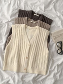 Kootud naiste vest V-kujulise krae ja nööpidega