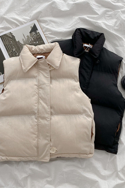 Klassikalise kraega vabaaja naiste vesti tavaline mudel