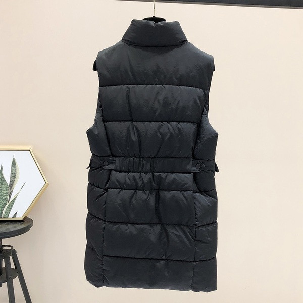 Naiste pikk taskute ja kõrge kraega vest