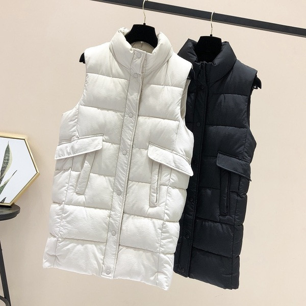 Naiste pikk taskute ja kõrge kraega vest