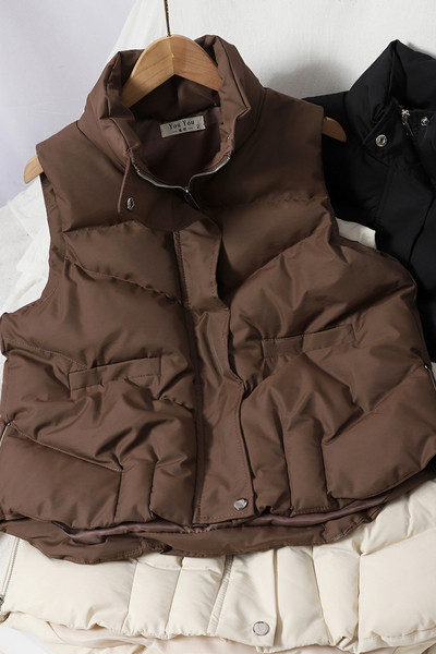 Kõrge krae ja taskutega vabaaja naistevest