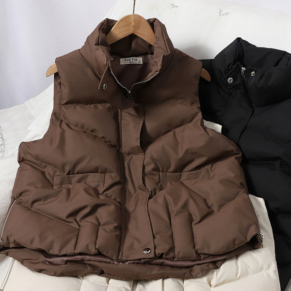 Kõrge krae ja taskutega vabaaja naistevest