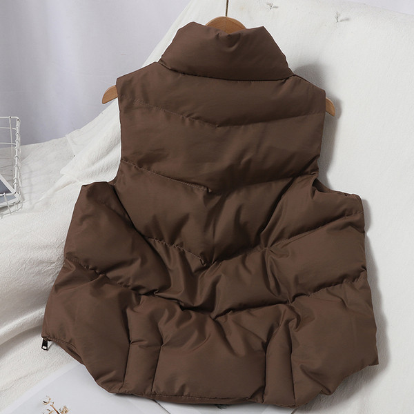 Kõrge krae ja taskutega vabaaja naistevest