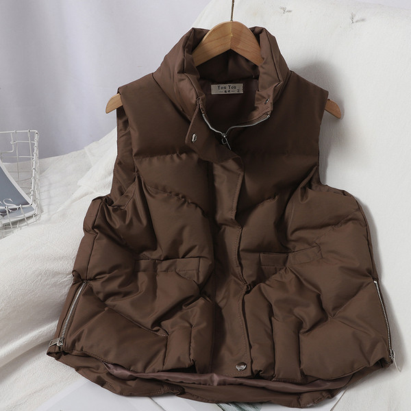 Kõrge krae ja taskutega vabaaja naistevest