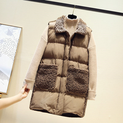 Uut mudelit pehme krae ja taskutega naistevest