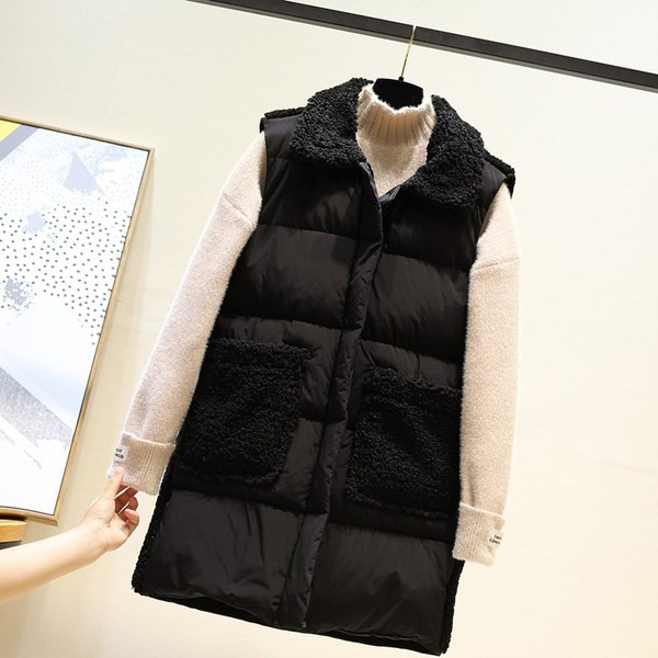 Uut mudelit pehme krae ja taskutega naistevest