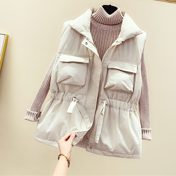 Moteriška žieminė liemenė su raiščiais ties juosmeniu ir kišenėmis