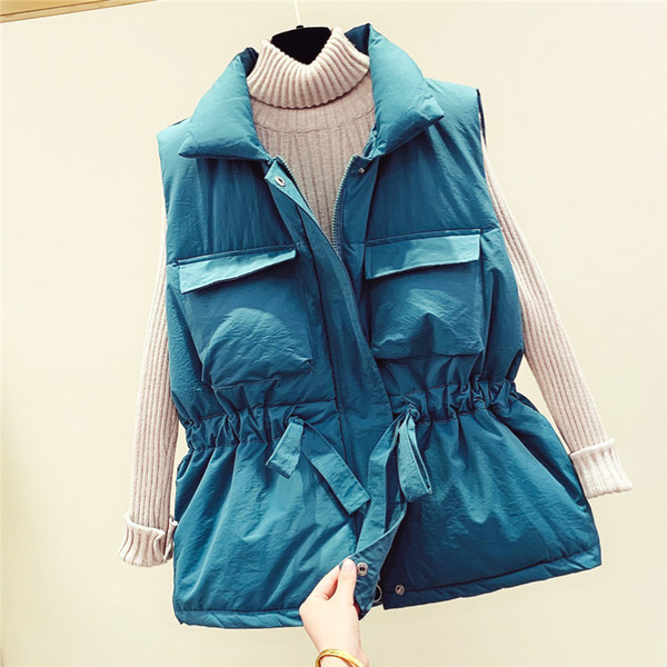 Moteriška žieminė liemenė su raiščiais ties juosmeniu ir kišenėmis