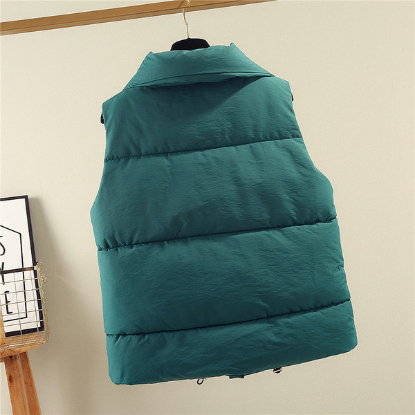 Sportlik-vabaaja naiste vest krae ja lukuga