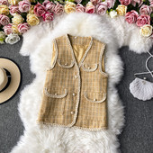 Kuldne naiste vest spitsikaela ja nööpidega