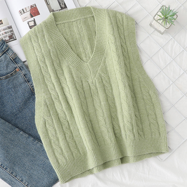 Spitsikaelusega vabaaja kootud vest naistele