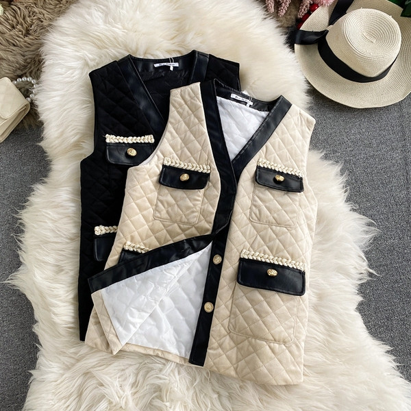 Moteriška laisvalaikio liemenė su auksinėmis sagomis ir kišene