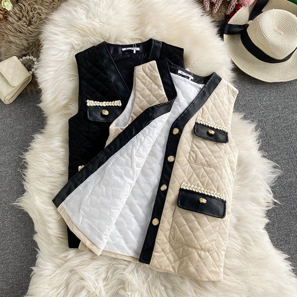 Moteriška laisvalaikio liemenė su auksinėmis sagomis ir kišene