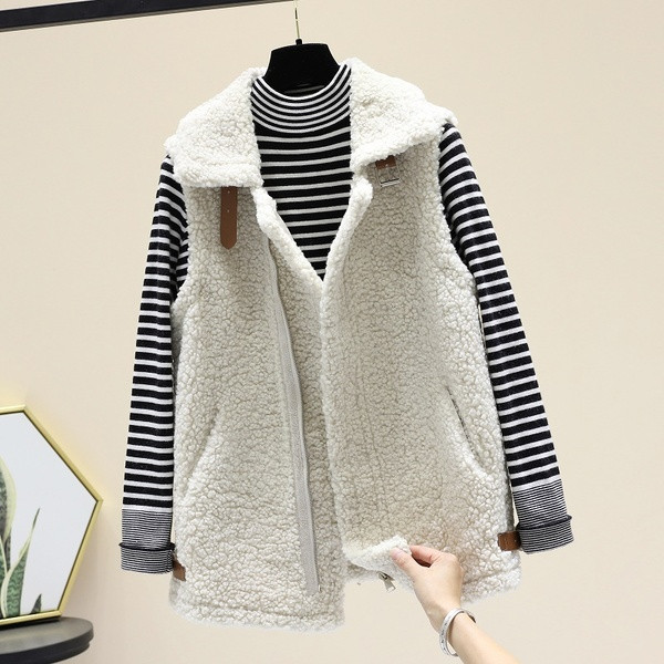 Moodne pandla ja taskutega naiste sulevest