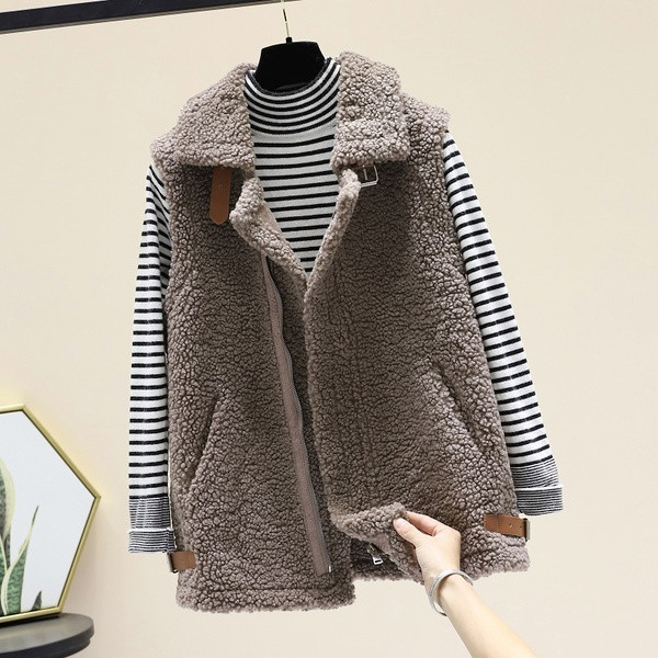 Moodne pandla ja taskutega naiste sulevest