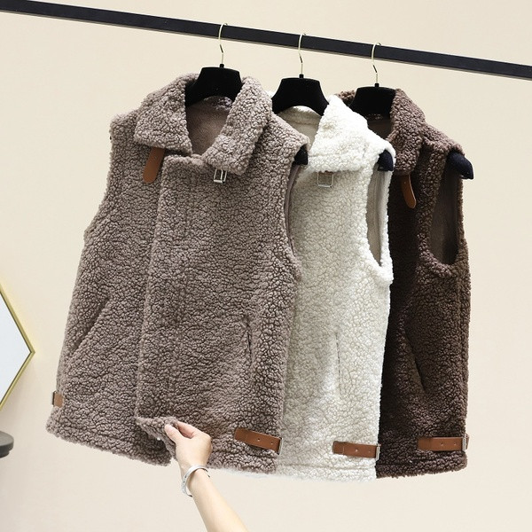 Moodne pandla ja taskutega naiste sulevest