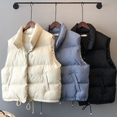 Naiste vest nööpide ja taskutega