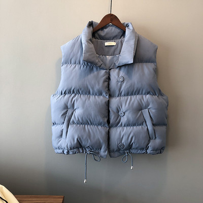 Naiste vest nööpide ja taskutega