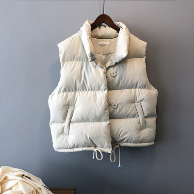 Naiste vest nööpide ja taskutega