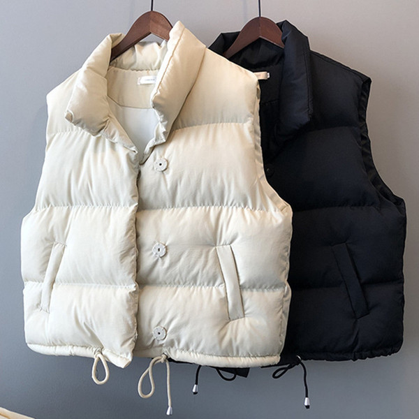 Naiste vest nööpide ja taskutega