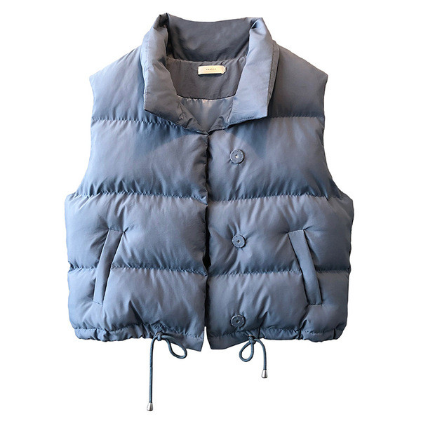 Naiste vest nööpide ja taskutega