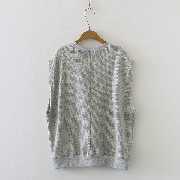 Ovaalse kaelusega naiste vest