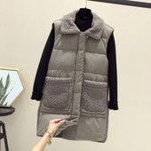 Naiste pikk taskute ja ududega vest