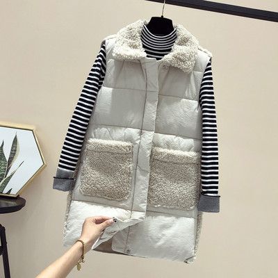 Naiste pikk taskute ja ududega vest