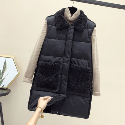 Naiste pikk taskute ja ududega vest