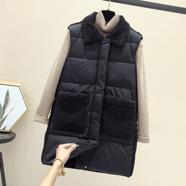 Naiste pikk taskute ja ududega vest